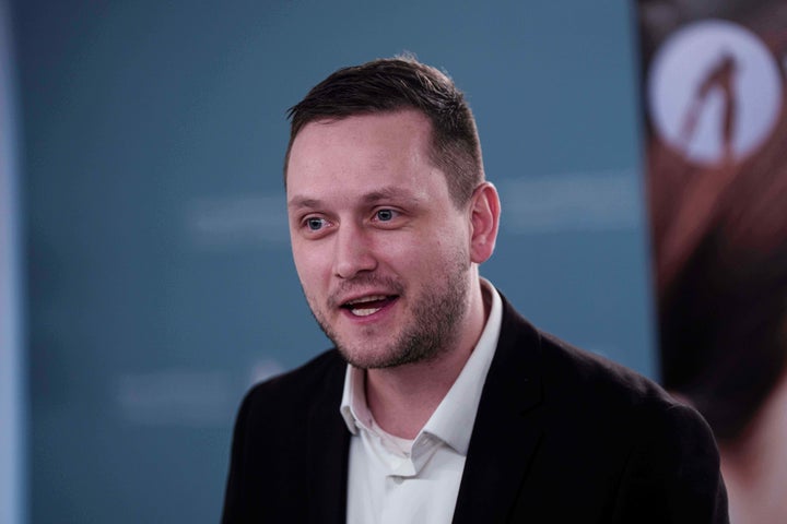 Greenlandic Prime Minister Jens-Frederik Nielsen speaks to journalists during press conference in Nuuk, Greenland, on Tuesday, Jan. 20, 2026. (AP Photo/Evgeniy Maloletka)