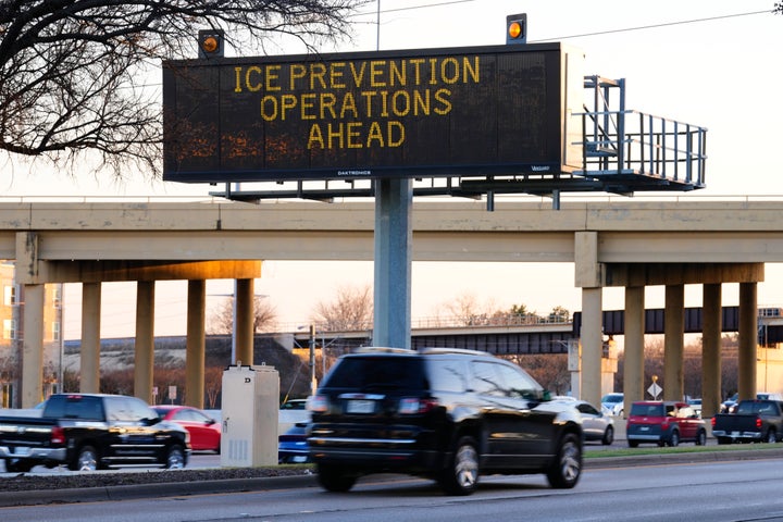 A digital billboard along Highway 75 warns of road preparations for upcoming inclement weather expected in the region Wednesday, Jan. 21, 2026, in Richardson, Texas. (AP Photo/Tony Gutierrez)