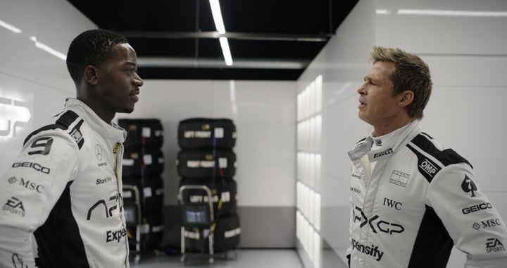 Damson Idris as Joshua Pearce and Brad Pitt as Sonny Hayes in "F1."