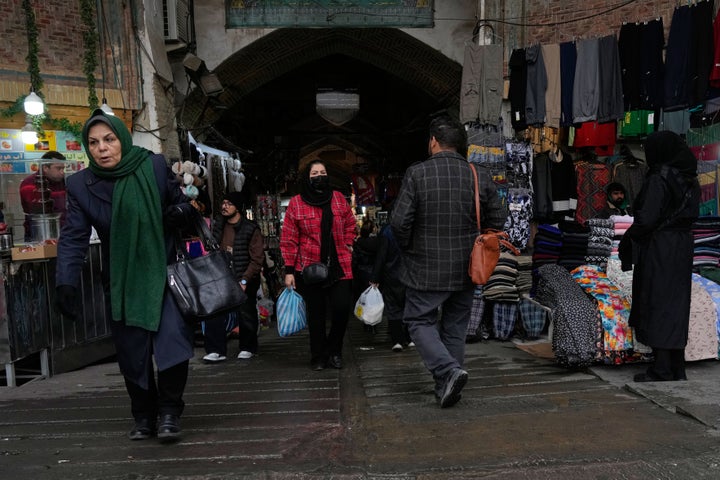 People walk at Tehran's historic Grand Bazaar, on Jan. 20, 2026, in Iran.