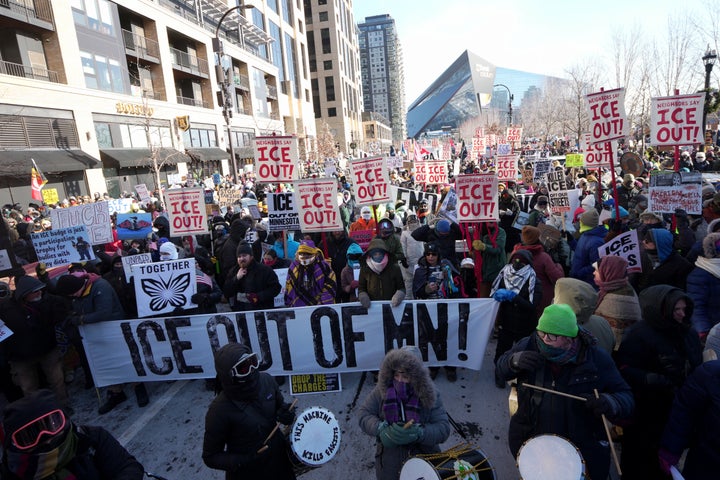 People protest against Federal immigration agents on Friday, Jan. 23, 2026, in Minneapolis. (AP Photo/Angelina Katsanis)