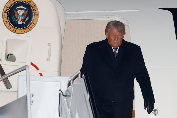 President Donald Trump arrives on Air Force One at Joint Base Andrews, Md., Thursday, Jan. 22, 2026, after returning from the World Economic Forum in Davos.(AP Photo/Luis M. Alvarez)
