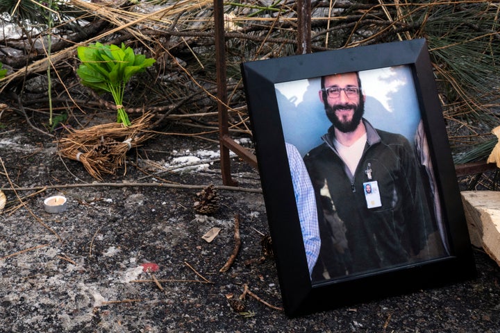 A photograph of 37-year-old Alex Pretti can be seen at a makeshift memorial in the area where he was shot dead by federal immigration agents earlier in the day in Minneapolis on Saturday. This is the second fatal shooting of a civilian during the Trump administration's unprecedented operation in the city, sparking fresh protests and outrage from state officials. Pretti's death came less than three weeks after Renee Good was shot and killed by an ICE officer. 