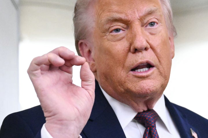 President Donald Trump speaks to reporters while on Air Force One last week.