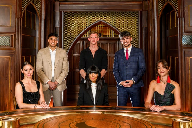 The cast of The Traitors 2026 pictured before the final round table vote of the series