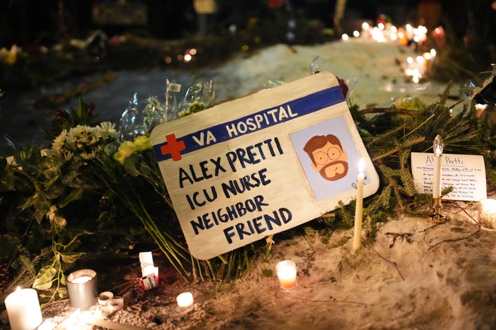 A sign for 37-year-old Alex Pretti, who was fatally shot by a U.S. Border Patrol agent, is displayed during a vigil Saturday in Minneapolis.