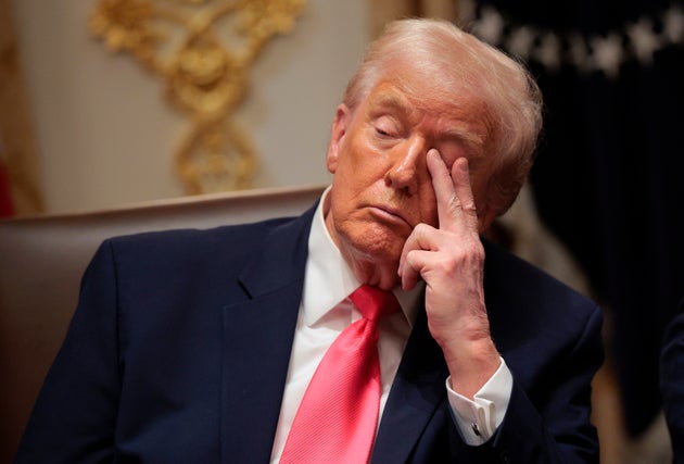 US President Donald Trump attends a meeting of his Cabinet in the Cabinet Room of the White House on December 02, 2025 in Washington, DC. 