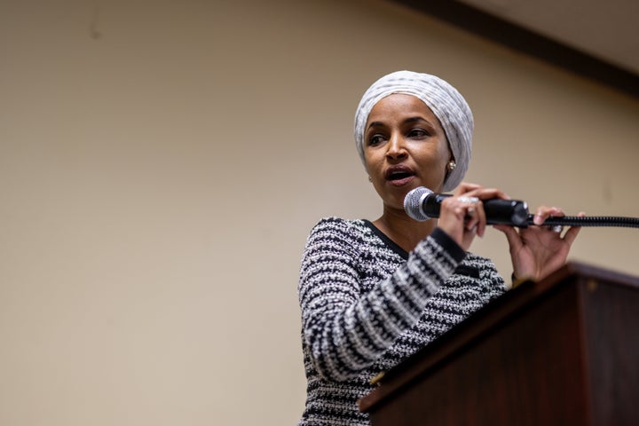 Rep. Ilhan Omar (D-Minn.) speaks during a town hall meeting where a man charged the podium and sprayed her with an unknown substance on January 27, 2026, in Minneapolis.