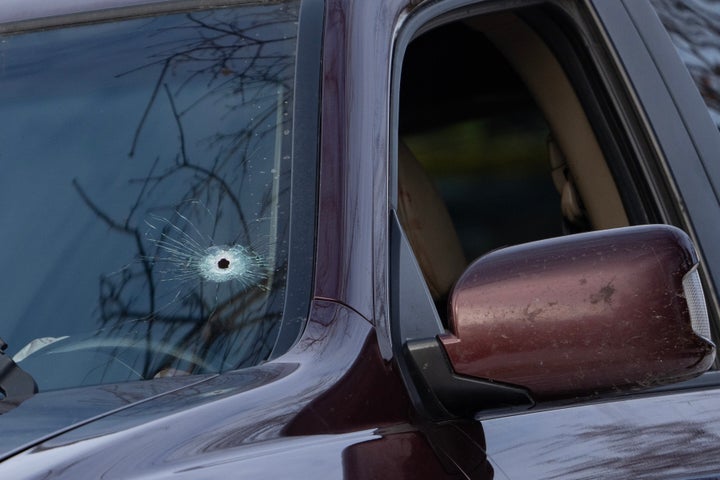 A single bullet hole can be seen on the driver's side of the windshield of a vehicle that a woman was shot and killed in by federal officers on Portland Ave. in Minneapolis, Minn. on Wednesday, January 7, 2026. (Photo by Alex Kormann/The Minnesota Star Tribune via Getty Images)