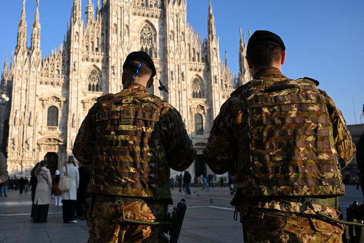 Millitary personnel stand guard in Piazza Duomo ahead of the Milano Cortina 2026 Olympic Games.