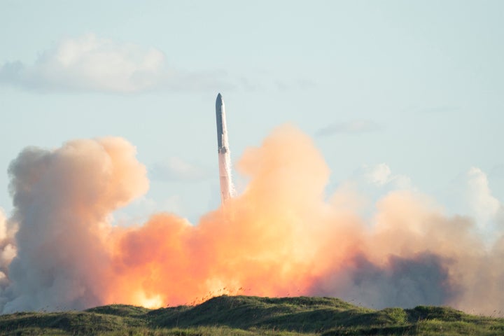 SpaceX's Starship rocket 38 launches during the 11th test flight on October 13, 2025 as seen from South Padre Island in Texas. (Photo by GABRIEL V. CARDENAS/AFP via Getty Images)