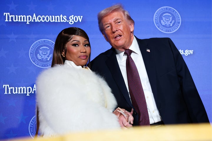 Nicki Minaj and President Donald Trump appear onstage Wednesday at an event celebrating the launch of "Trump Accounts" in Washington, DC.