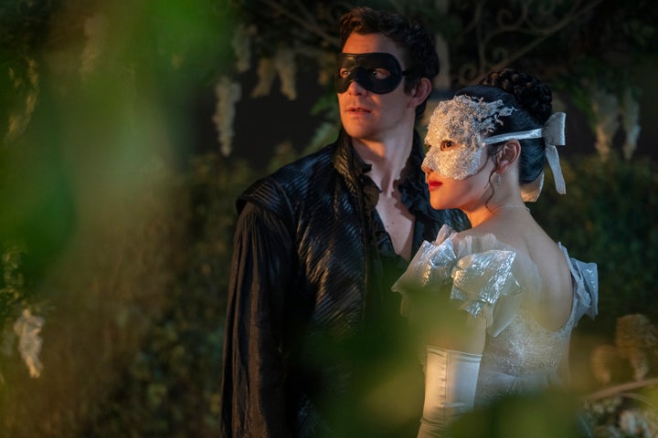 Benedict Bridgerton meets the mysterious "Lady In Silver" at a masquerade ball early on in season four