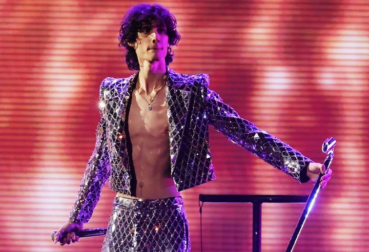 Nominated for Best New Artist somber on stage during the 2026 Grammys.