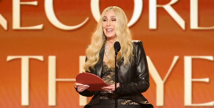 Cher presents the award for Record of the Year at Sunday's Grammy Awards in Los Angeles. 