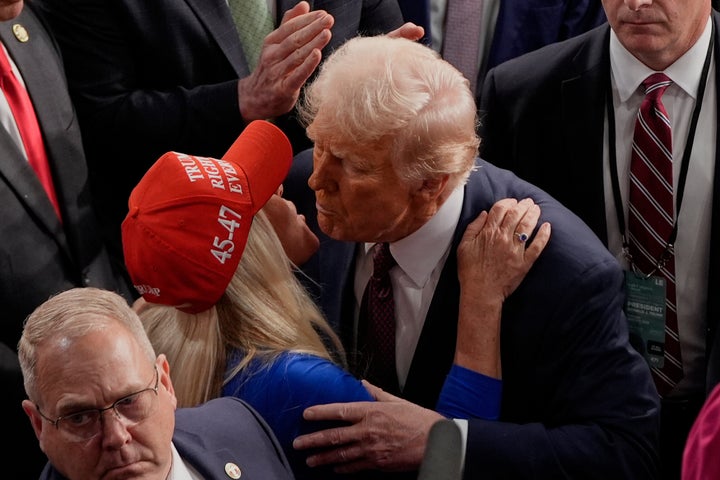 President Donald Trump greets Rep. Marjorie Taylor Greene, R-Ga., after addressing a joint session of Congress in the House chamber at the U.S. Capitol in Washington, Tuesday, March 4, 2025. 