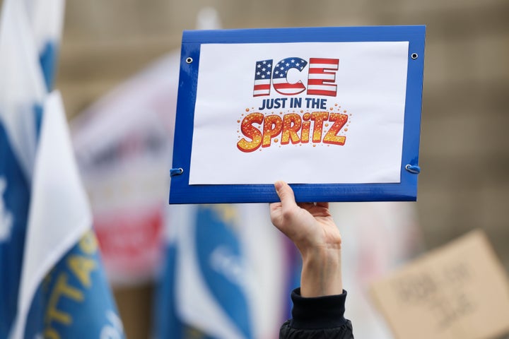 Demonstrators protest against the deployment of ICE agents during the Milan Cortina Winter Olympics.