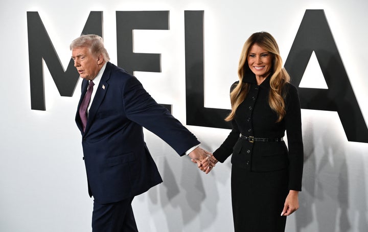 President Donald Trump drags his wife off the red carpet at the world premiere of 
