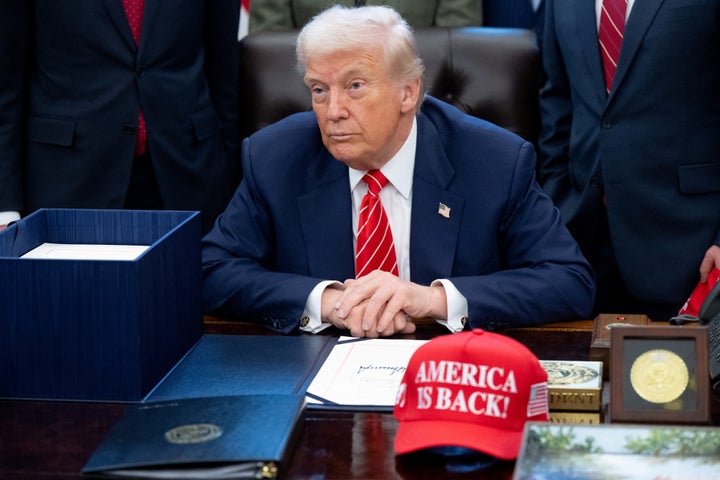 US President Donald Trump speaks with the media after signing a funding bill to end a partial government shutdown in the Oval Office of the White House in Washington, DC, February 3, 2026. (Photo by SAUL LOEB / AFP via Getty Images)