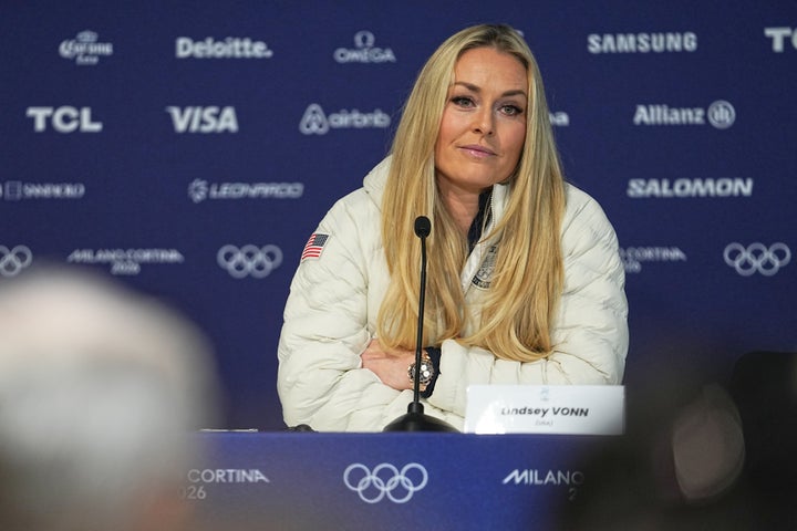 Team USA's Lindsey Vonn attends a press conference in Cortina d'Ampezzo, Italy, on Tuesday. The 41-year-old alpine skier revealed she was "confident" that she would compete in the 2026 Milan Cortina Games despite sustaining a left knee injury in a crash last week.
