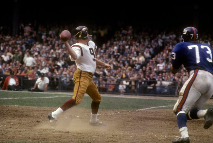 NEW YORK - CIRCA 1965: Quarterback Sonny Jurgensen #9 of the Washington Redskins drops back to pass against the New York Giants during an NFL football game circa 1965 at Yankee Stadium in the Bronx borough of New York City. Jurgenson played for the Redskins from 1964 to 1974. (Photo by Focus on Sport/Getty Images)