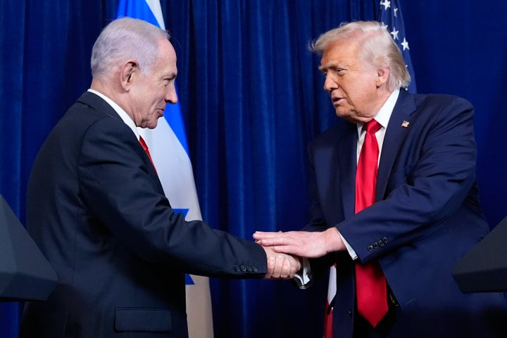 President Donald Trump shakes hands with Israel's Prime Minister Benjamin Netanyahu during a news conference at Mar-a-Lago, Monday, Dec. 29, 2025, in Palm Beach, Fla. (AP Photo/Alex Brandon)