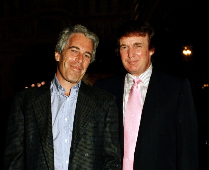 Portrait of American financier Jeffrey Epstein (left) and real estate developer Donald Trump as they pose together at the Mar-a-Lago estate, Palm Beach, Florida on February 22, 1997. (Photo by Davidoff Studios/Getty Images)