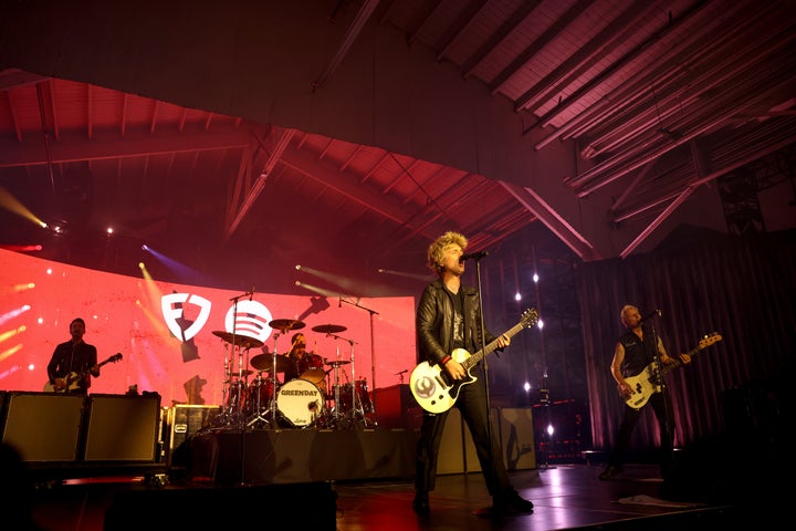 Green Day, seen here playing in San Francisco on Friday, may or may not get political during their Super Bowl pre-game performance. But they probably will.