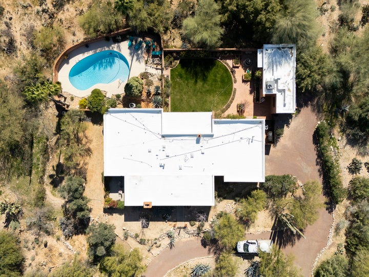 TUCSON, ARIZONA - FEBRUARY 7: An aerial view shows the home of Nancy Guthrie on February 7, 2026 in Tucson, Arizona. The 84-year-old mother of U.S. journalist and television host Savannah Guthrie went missing from her home in the early hours of Sunday, Feb. 1. (Photo by Rebecca Noble/Getty Images)