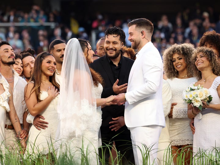 A couple is married during the Apple Music Super Bowl LX Halftime Show at Levi's Stadium on Feb. 8, 2026, in Santa Clara, California. 