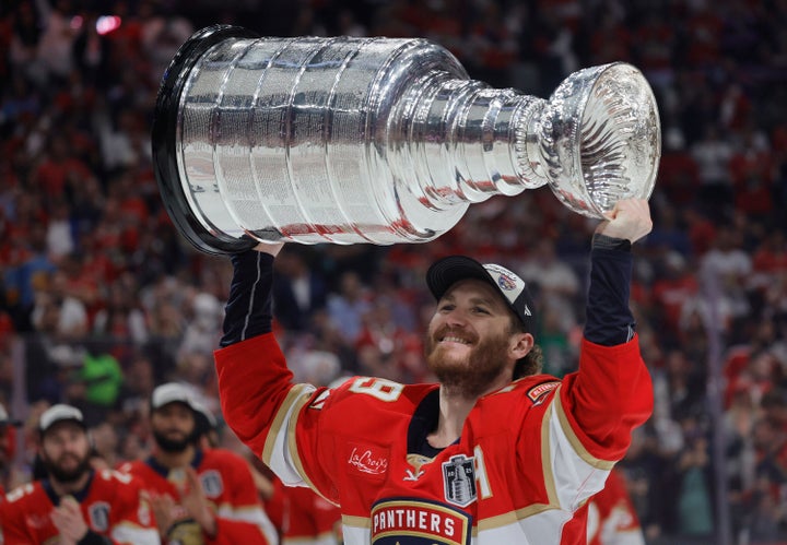 Florida Panthers left wing Matthew Tkachuk skates with the Stanley Cup after a series-clinching win in Game 6 of the Stanley Cup Final on June 17, 2025, at Amerant Bank Arena in Sunrise, Fla.