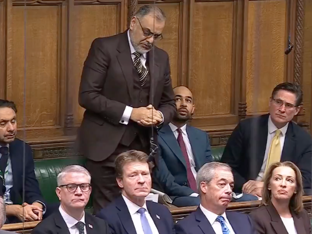 Ayoub Khan looks at Nigel Farage during PMQs.