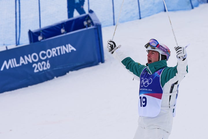 Cooper Woods celebrates his gold medal victory.