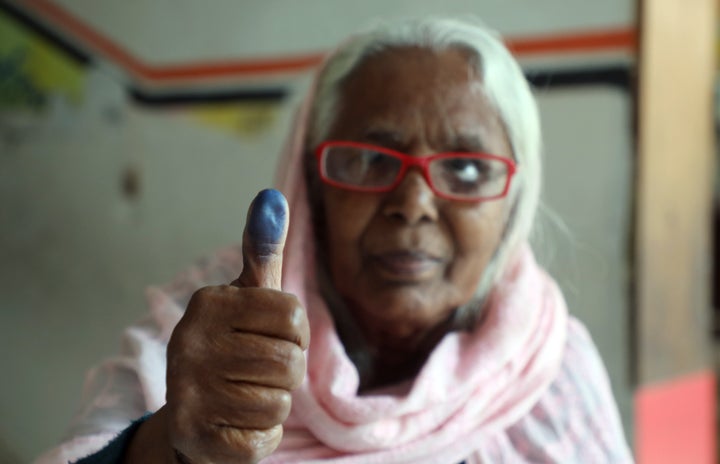 Election officials count ballots after polling concludes in Bangladesh's 13th National Parliament Election and nationwide referendum. (Photo by Sony Ramani/NurPhoto via Getty Images)