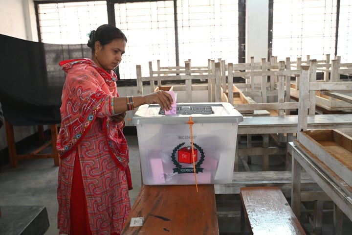 A female voter casts her ballot to vote during the 13th general election in Dhaka, Bangladesh, on February 12, 2026. (Photo by Mamunur Rashid/NurPhoto via Getty Images)