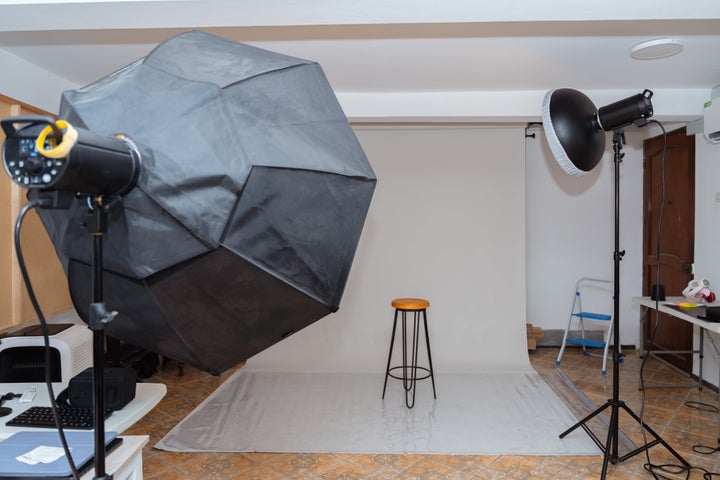 Several school districts have said they will investigate Lifetouch over the former owner of its parent company, while one school said it was canceling its school photos altogether.