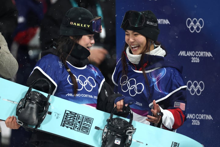 South Korean snowboarder Gaon Choi laughs with silver medalist Chloe Kim after the women's halfpipe final in Livigno, Italy. As Choi celebrated the victory, Kim hugged the 17-year-old snowboarder in a sweet show of support.