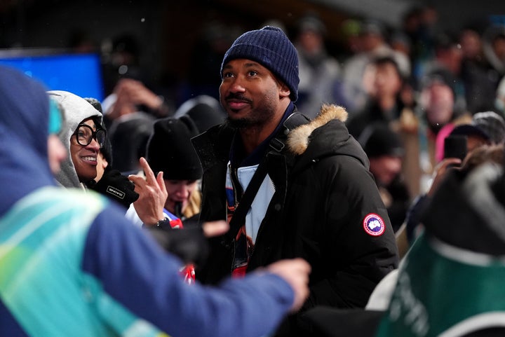 Chloe Kim's boyfriend, Cleveland Browns star Myles Garrett, cheers on his partner during the women's halfpipe finals on Thursday.