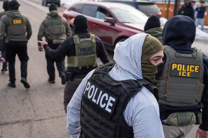 FILE - Federal agents conduct immigration enforcement operations Thursday, Feb. 5, 2026, in Minneapolis. (AP Photo/Ryan Murphy, File)