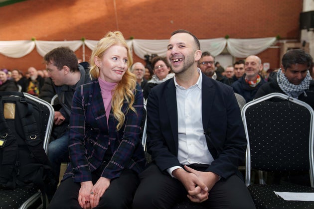 Green Party leader Zack Polanski, right, sits with the party candidate is the Gorton and Denton by-election Hannah Spencer in Manchester, England, Friday, Jan. 30, 2026.