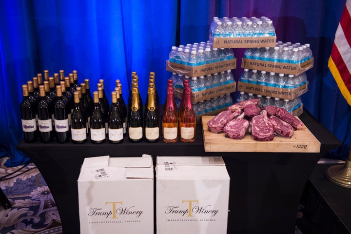 A display including Trump's branded wine, champagne, water, and steak from a 2016 campaign press conference event at the Trump National Golf Club.