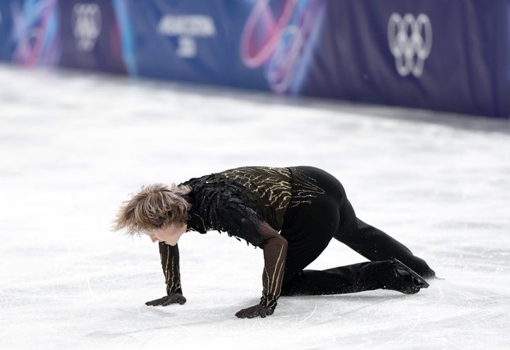 MILAN, ITALY – FEBRUARY 13: Ilia Malinin of Team United States falls over in the Men's Singles Skating on day seven of the Milano Cortina 2026 Winter Olympics at the Milano Ice Skating Arena on February 13, 2026 in Milan, Italy. (Photo by Joosep Martinson/Getty Images)