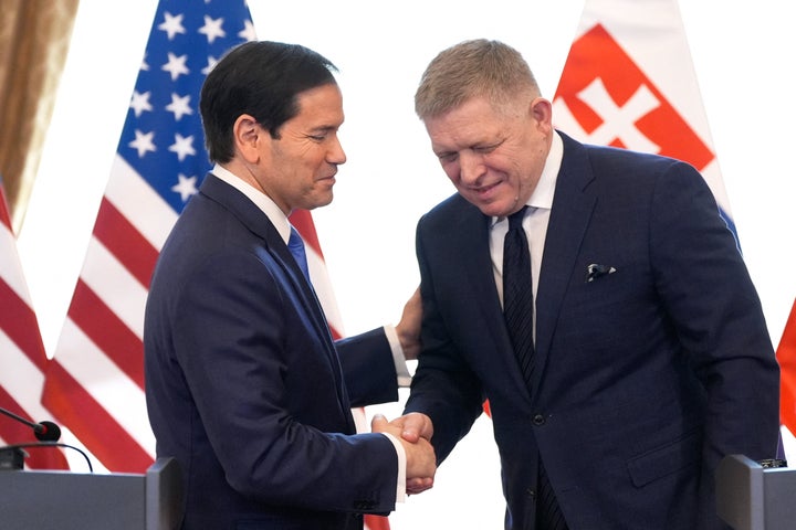 U.S. Secretary of State Marco Rubio (L) and Slovakia's Prime Minister Robert Fico shake hands at the end of a joint news conference in Bratislava, Slovakia, on February 15, 2026.