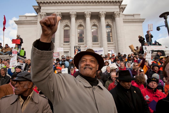 Jackson gives a thumbs up during a Martin Luther King rally at the state Capitol in Madison, Wis., in 2011.