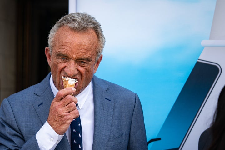Kennedy eats ice cream during a news conference in 2025.