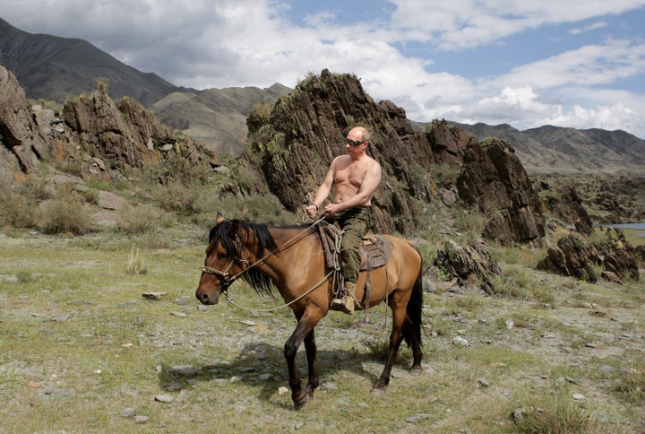 Russian Prime Minister Vladimir Putin rides a horse during his vacation outside the town of Kyzyl in Southern Siberia on Aug. 3, 2009.