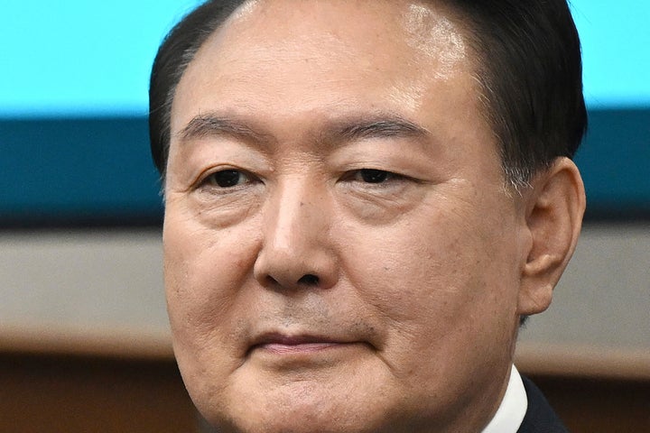 Then South Korea's ousted President Yoon Suk Yeol, who is facing charges of orchestrating a rebellion when he declared martial law on Dec. 3, attends his criminal trial at a courtroom of the Seoul Central District Court in Seoul, on April 21, 2025.