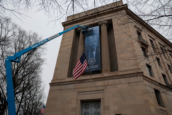 Donald Trump's banner now hangs in the Department of Justice.