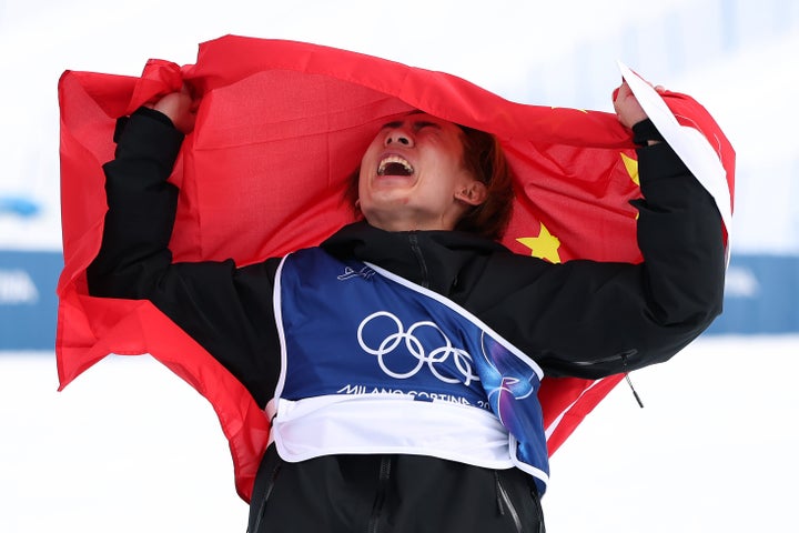 China's Su Yiming celebrates after winning the men's slopestyle final.