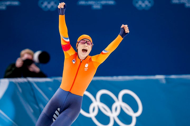 Femke Kok of the Netherlands celebrates after the 500 meter speed skating event.
